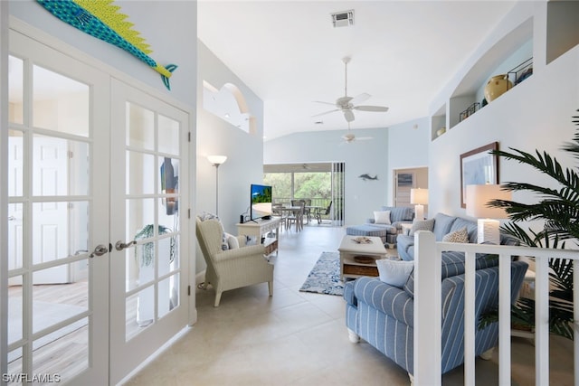 living room featuring french doors, ceiling fan, and lofted ceiling