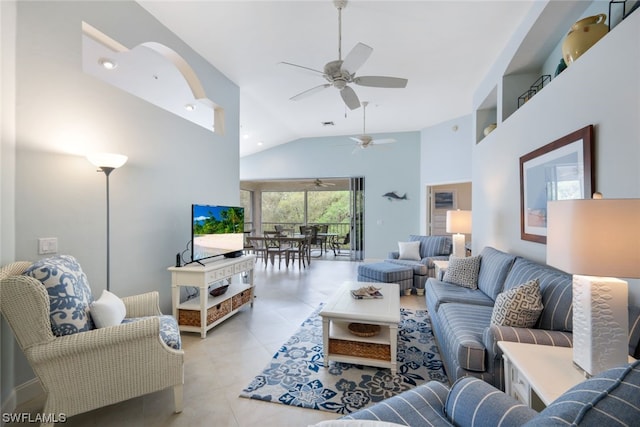 living room with high vaulted ceiling, ceiling fan, and light tile flooring