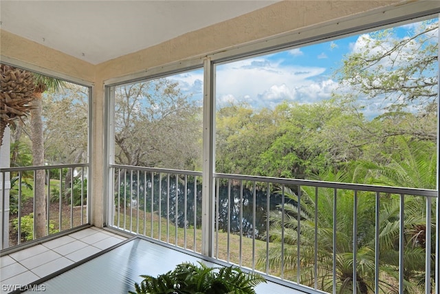 unfurnished sunroom featuring a wealth of natural light