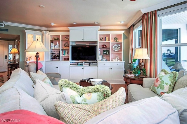 living room with hardwood / wood-style floors and crown molding