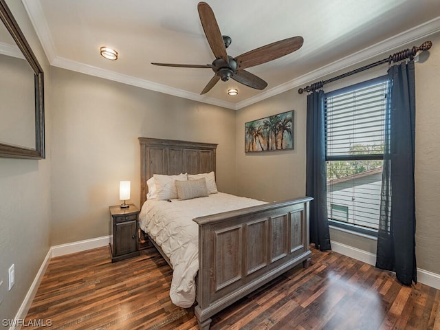 bedroom featuring dark hardwood / wood-style floors, ceiling fan, and ornamental molding