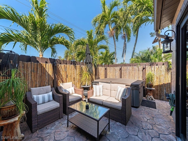 view of patio with a fenced backyard and an outdoor living space