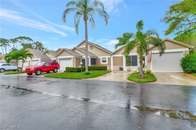 single story home with a garage