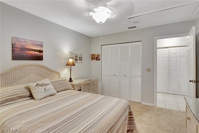 bedroom featuring ceiling fan and light colored carpet