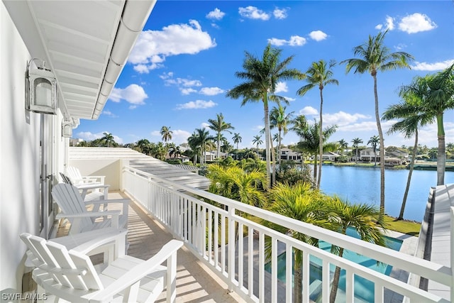 balcony featuring a water view