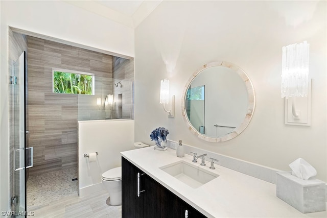 bathroom featuring an enclosed shower, toilet, tile floors, and large vanity