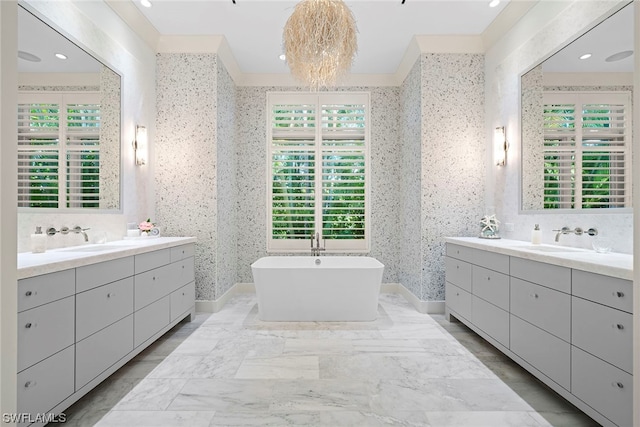 bathroom featuring vanity, tile floors, and a healthy amount of sunlight