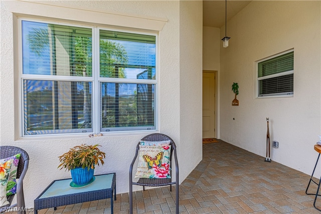 doorway to property featuring a patio