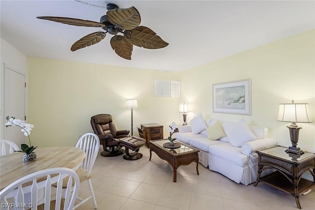 living room featuring ceiling fan and light tile patterned flooring