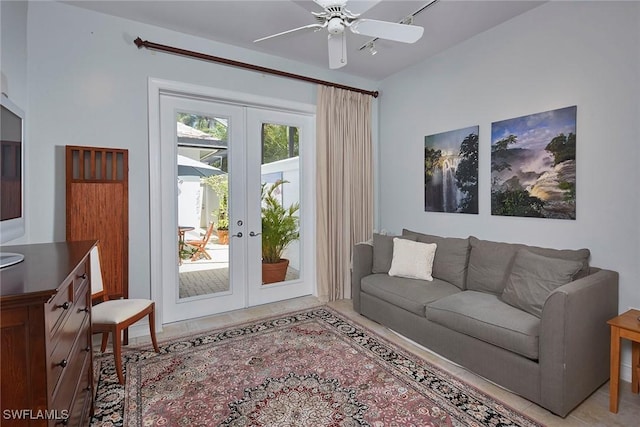 living room with ceiling fan and french doors