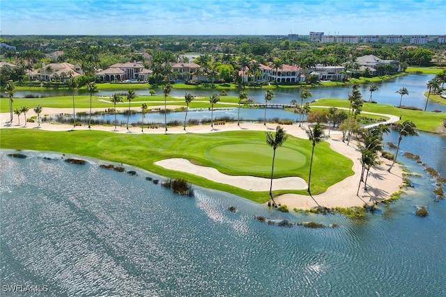 view of property's community featuring a water view and golf course view