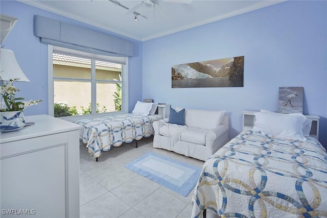 bedroom featuring light tile patterned floors, ceiling fan, and ornamental molding