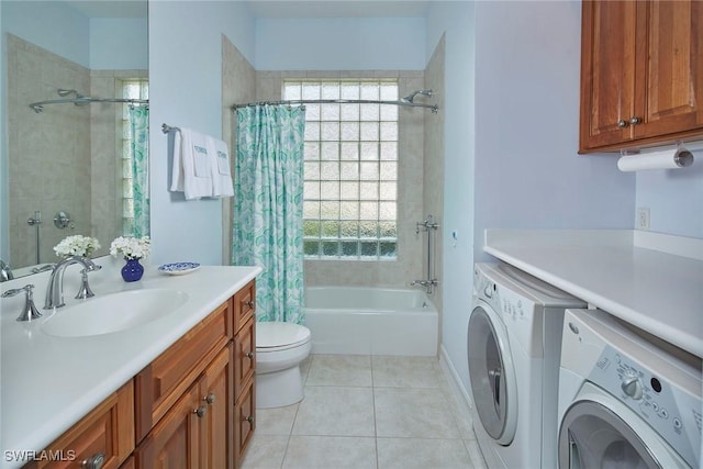 bathroom with plenty of natural light, shower / bathtub combination with curtain, tile patterned floors, and washing machine and clothes dryer