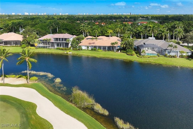 bird's eye view featuring a water view and view of golf course