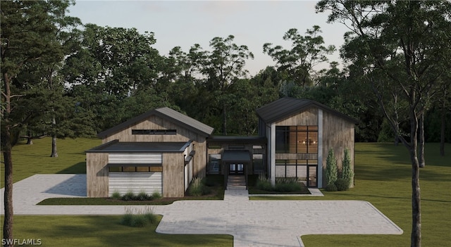 view of front of home with an outdoor structure and a front lawn