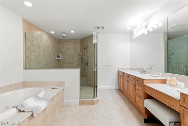 bathroom with a stall shower, visible vents, tile patterned floors, vanity, and a bath