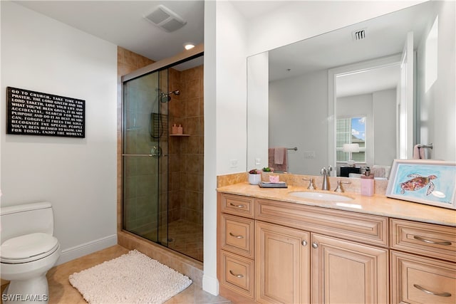 bathroom featuring visible vents, toilet, tile patterned floors, vanity, and a shower stall