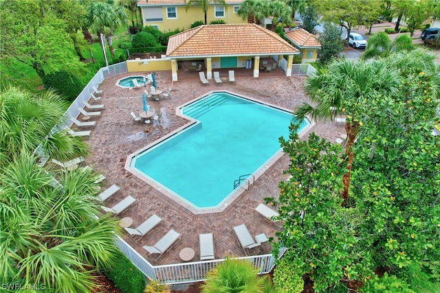 view of swimming pool with a patio area