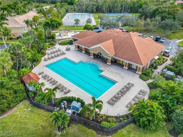 view of swimming pool featuring a patio area