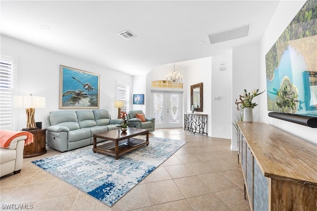 tiled living room with an inviting chandelier