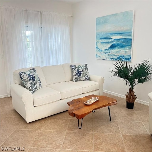 living room featuring light tile patterned flooring