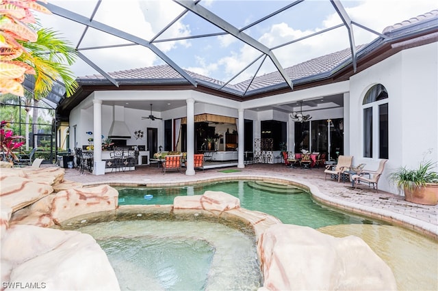 view of pool featuring ceiling fan and a patio area