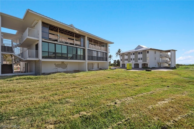 exterior space featuring a yard and a patio area