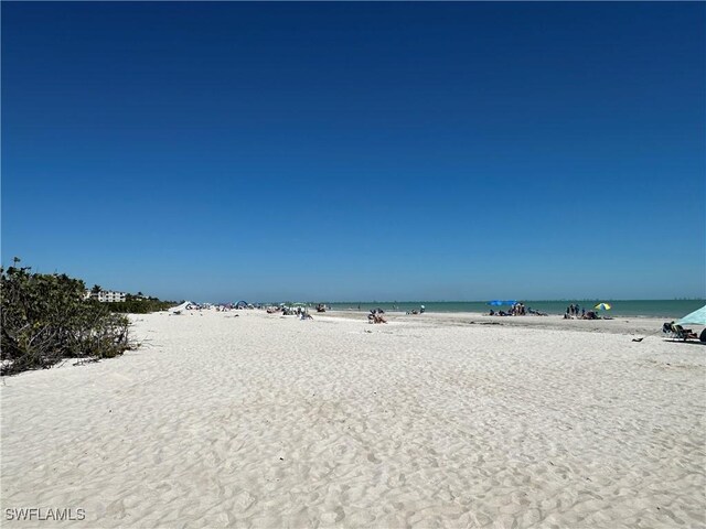 water view featuring a beach view