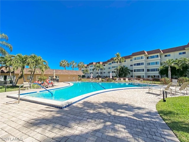 view of pool featuring a patio area