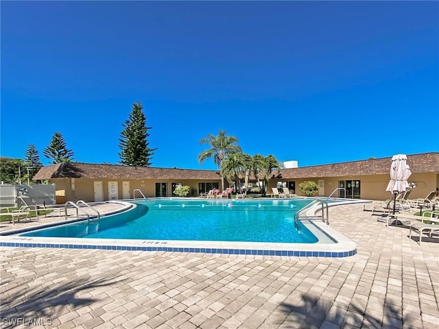 view of pool featuring a patio area