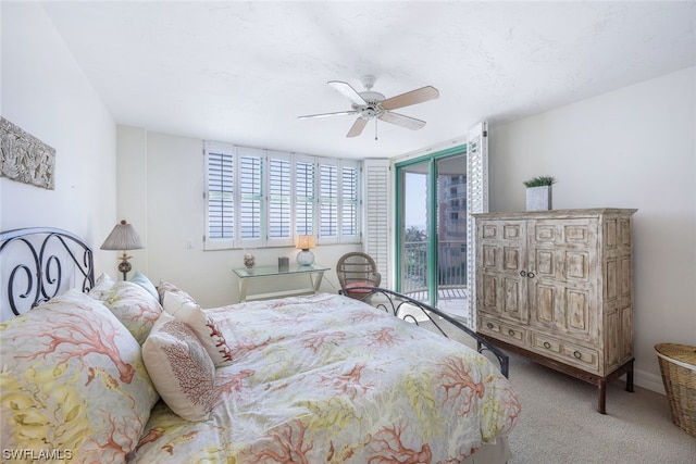 bedroom with light carpet, access to exterior, and ceiling fan