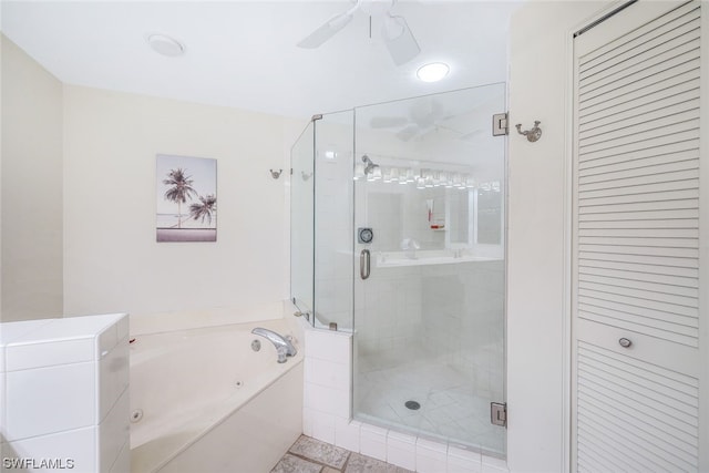 bathroom featuring tile floors, independent shower and bath, and ceiling fan