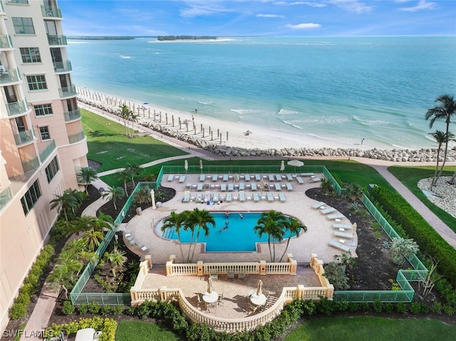 aerial view featuring a water view and a view of the beach