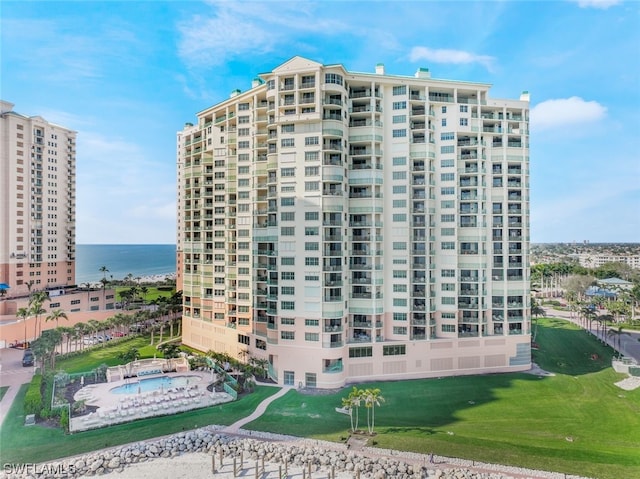 view of building exterior with a water view