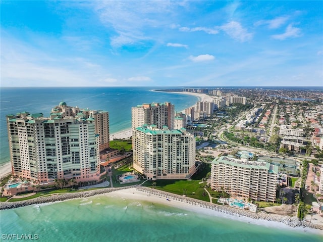 bird's eye view with a water view and a view of the beach