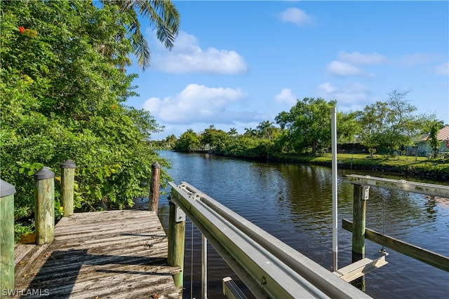 view of dock with a water view