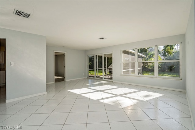 view of tiled spare room