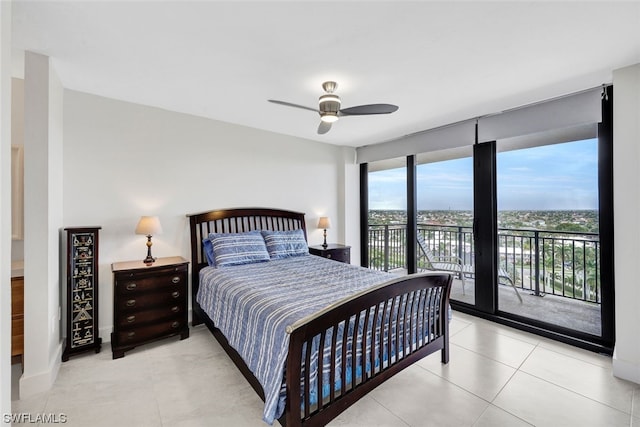 bedroom featuring ceiling fan, light tile flooring, and access to outside