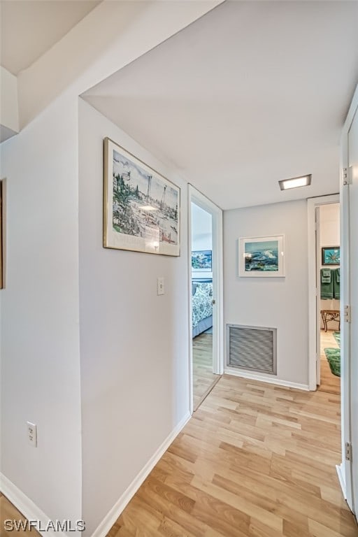 hall featuring light wood-type flooring