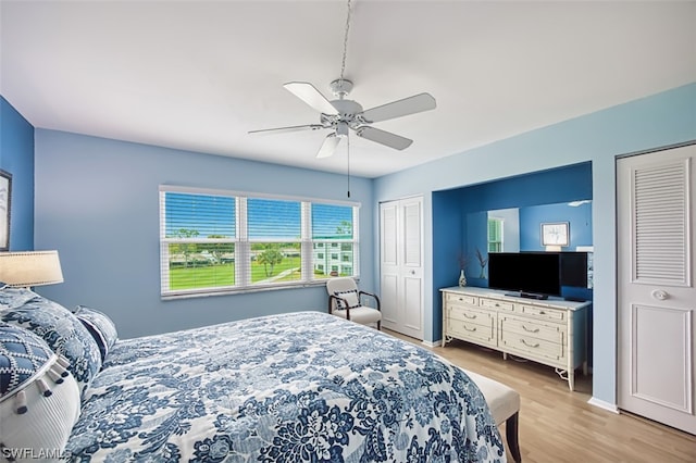 bedroom featuring ceiling fan and light wood-type flooring