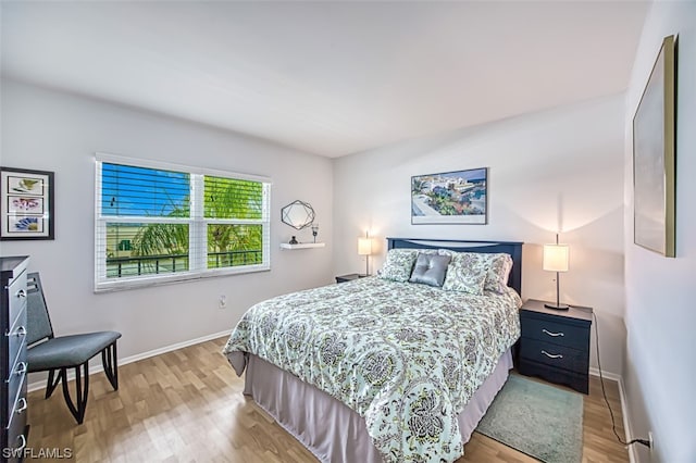 bedroom with light wood-type flooring