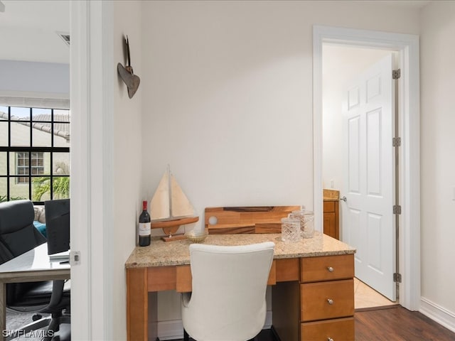 office area featuring dark wood-type flooring