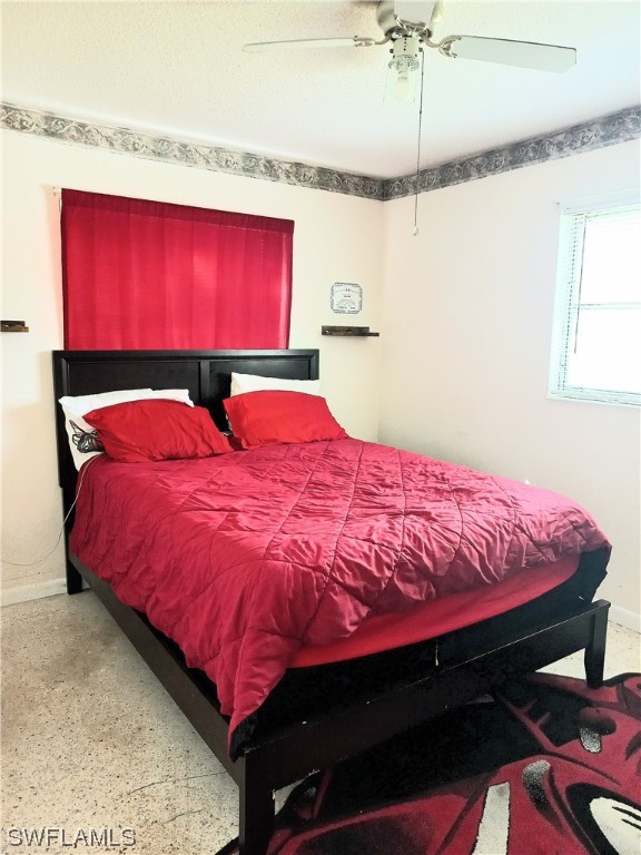 bedroom featuring ceiling fan