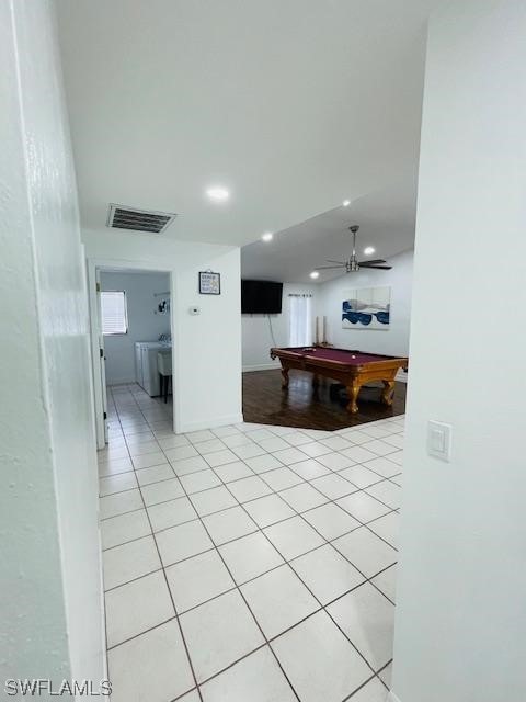 kitchen featuring billiards, light tile floors, and ceiling fan