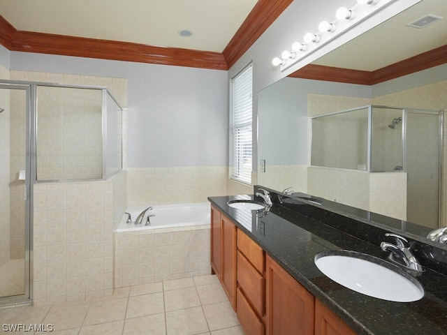 bathroom featuring plus walk in shower, dual sinks, tile flooring, large vanity, and ornamental molding