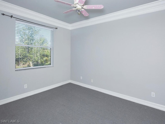 carpeted empty room featuring ornamental molding and ceiling fan