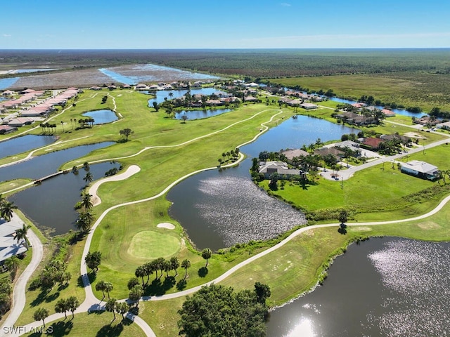 bird's eye view with a water view