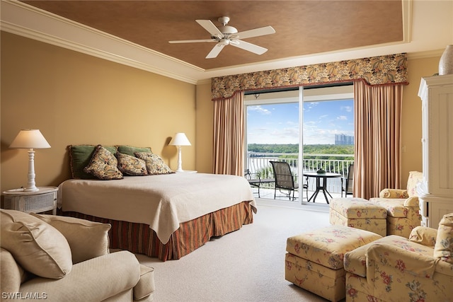 carpeted bedroom featuring ceiling fan, crown molding, and access to exterior