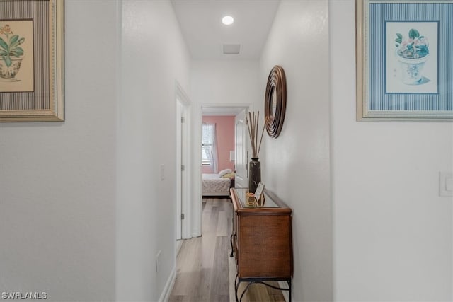 hall featuring light hardwood / wood-style flooring