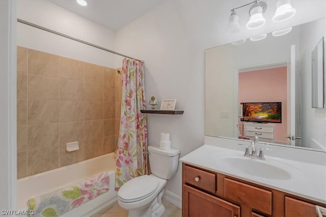 full bathroom with toilet, large vanity, shower / bath combo, and tile flooring